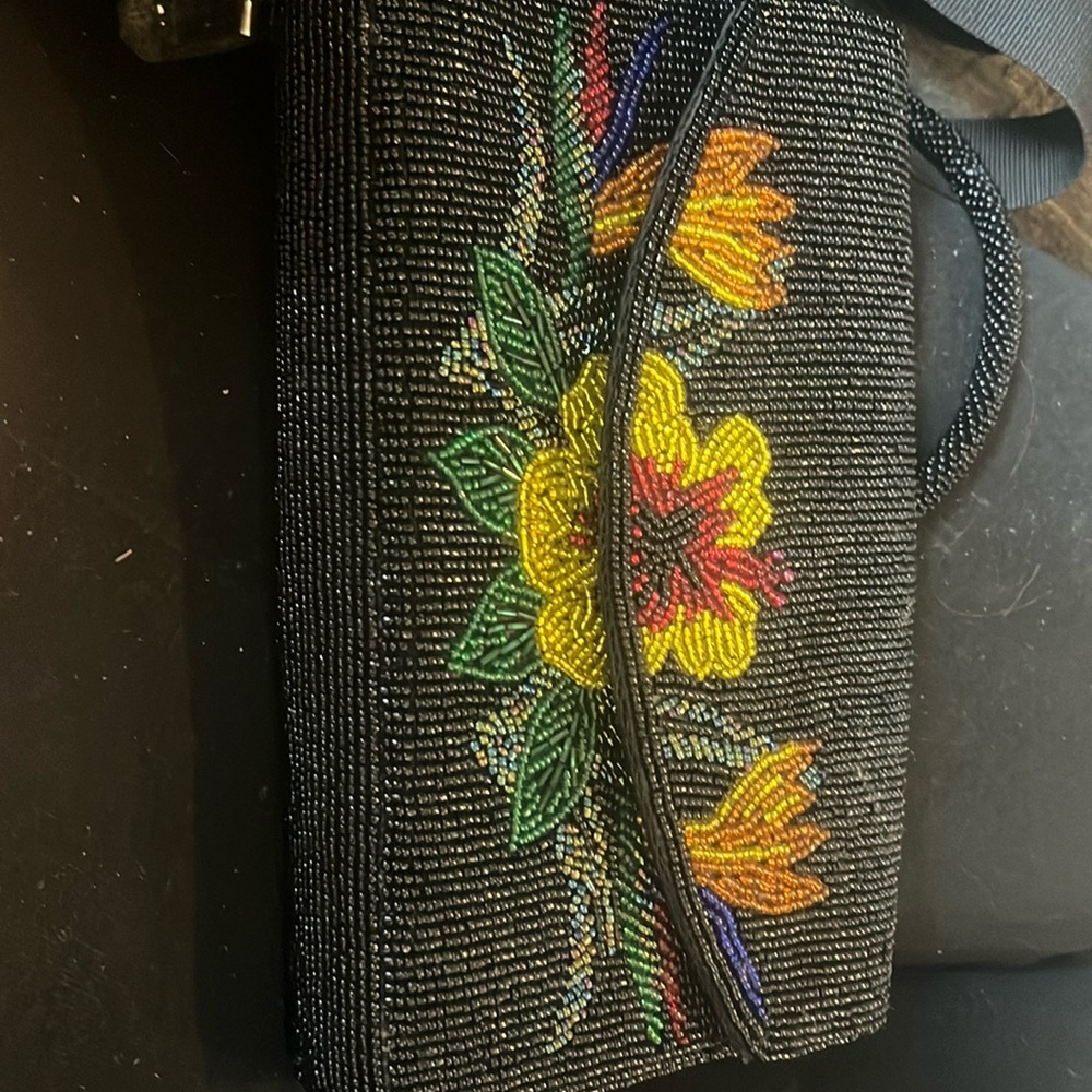 Maui by design clutch gently used
